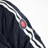 Blouson bombers cobrandé Blacks Legend & Peter Mc Andrew (zoom sur le badge de la manche)