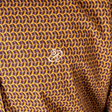 Chemise Homme marron à manches longues et imprimé ballon de rugby (zoom sur le tissu imprimé)