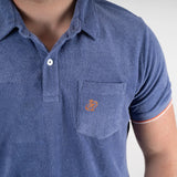 Polo orange en tissu éponge pour Homme (zoom poitrine)