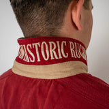 Polo homme à manches longues Barbarians rouge acajou (zoom sur la broderie sous col)