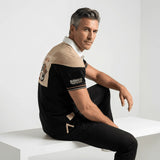 Polo scapulaire beige et noir Barbarians BACK to LEGEND (vue de 3/4 dos)