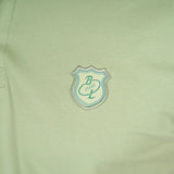 Polo homme vert amande en jersey élasthanne Blacks Legend (zoom sur le logo brodé)