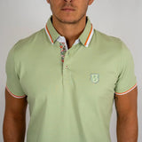 Polo homme vert amande en jersey élasthanne Blacks Legend (zoom sur la poitrine)