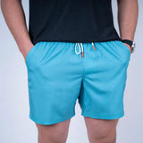 Short de bain bicolore turquoise et marine BACK to LEGEND
