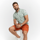 Almond green polo shirt floral print