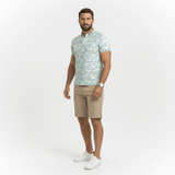 Almond green polo shirt floral print