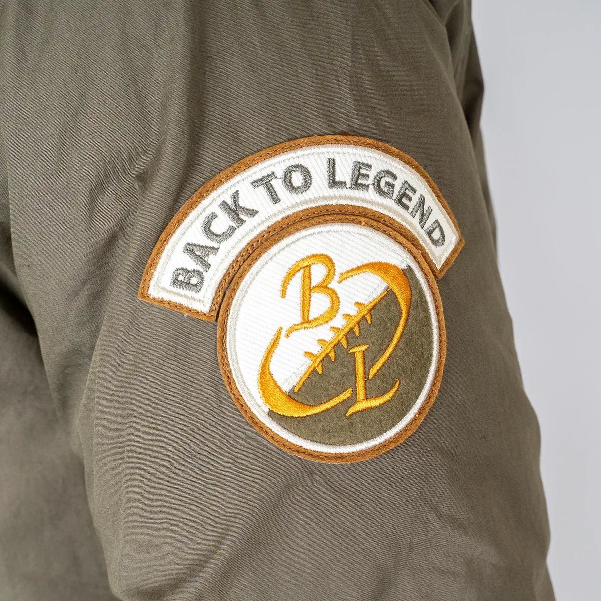 Parka réversible bicolore orange et kaki pour homme BACK to LEGEND (patch épaule)