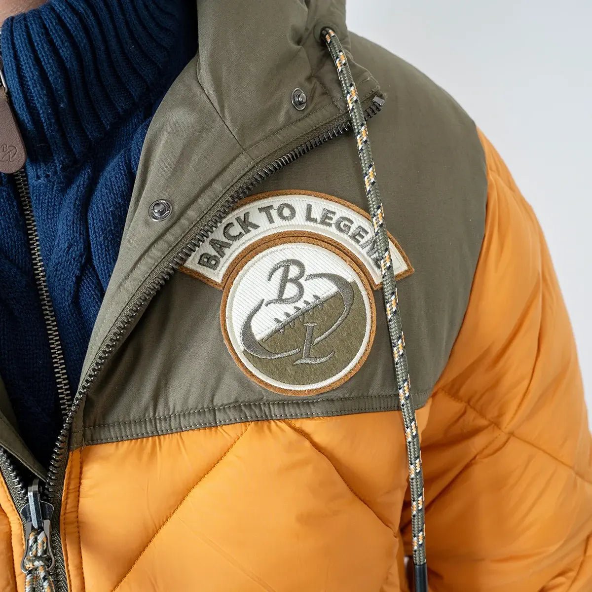 Parka réversible bicolore orange et kaki pour homme BACK to LEGEND (patch poitrine)