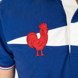 Polo bleu roi Barbarians BACK to LEGEND (zoom sur le coq rouge)