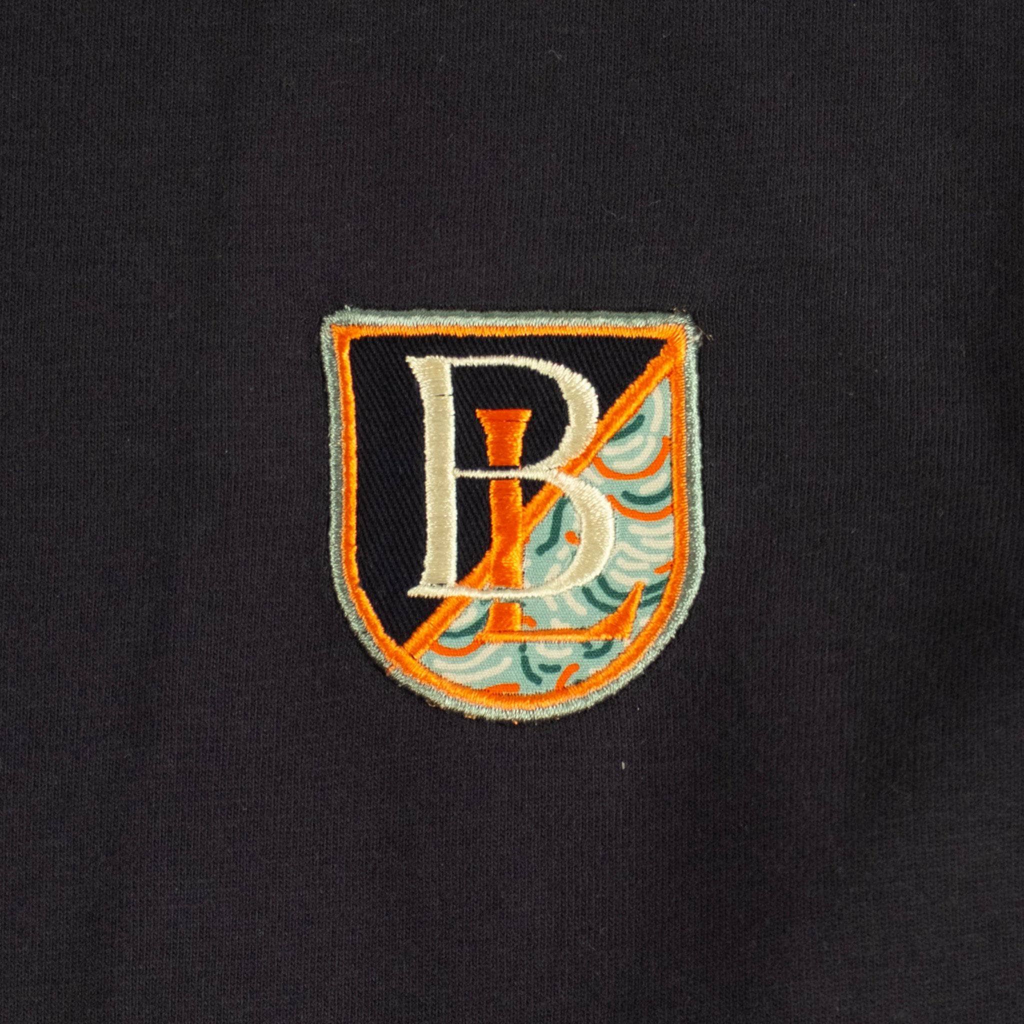 Polo homme BACK TO LEGEND à manches longues homme bleu marine toucher peau de pêche (zoom broderie signature)