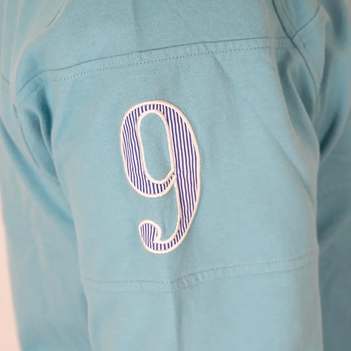 Polo ml jersey peau de pêche bleu turquoise n°9 BACK to LEGEND (zoom sur le numéro 9)