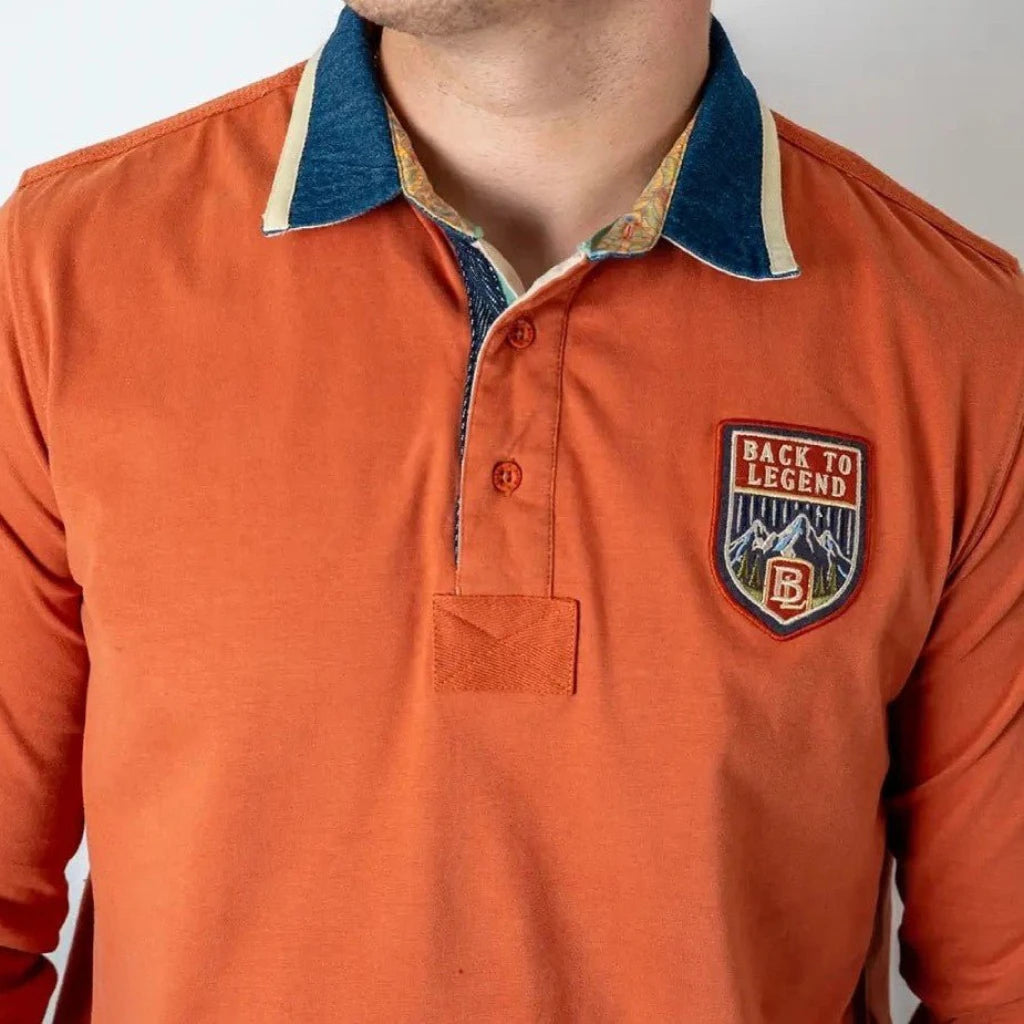 Polo manches longues orange col contrasté BACK to LEGEND (zoom poitrine et col)
