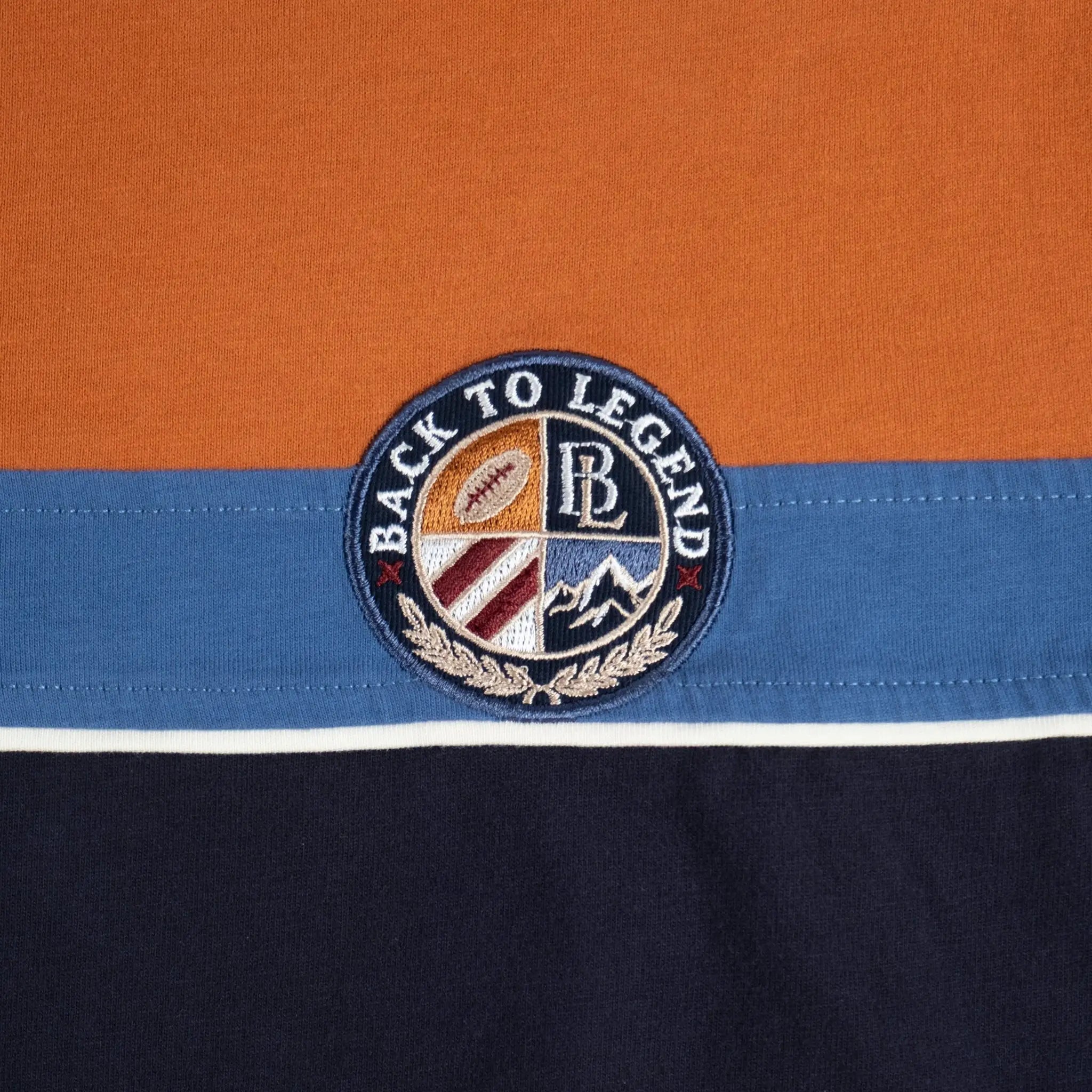 Polo à manches longues homme tricolore toucher peau de pêche BACK TO LEGEND (zoom écusson signature rond)